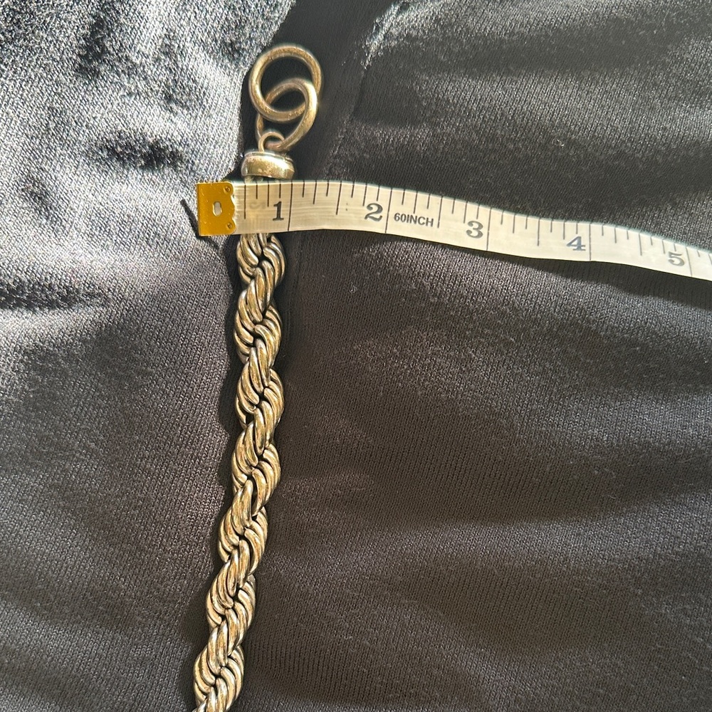 Elegant Silver Twist Bracelet - Picture 2 of 3